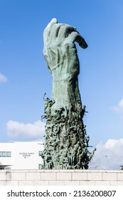 MIAMI BEACH, FL, USA - OCTOBER 14, 2019: The Holocaust Memorial In Miami Beach Features A Reflection Pool With A Hand Reaching Up And Bodies Climbing,  A Memorial Wall, And Memorial Bridge.