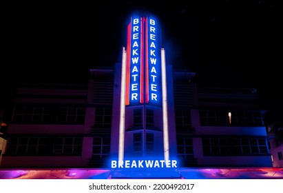 Miami Beach, FL, US-November 20, 2021: Nighttime Scene Of Art Deco Hotels Lining Ocean Boulevard In The Trendy South Beach Area Including The Historic Breakwater Hotel.