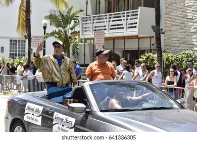 MIAMI BEACH, FLORIDA, APRIL 9, 2016: The 8th Annual Miami Gay Pride, Ocean Drive In Miami Beach, Florida. Lesbian, Gay, Bi, Transgender Celebrate. Happy Old Guys Couple In The Car. 