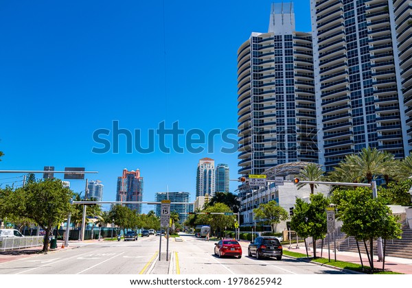 Miami Beach, Florida, USA - 2020: Road in Miami\
Beach. Expensive real estate in a beautiful southern city in\
Florida, street style