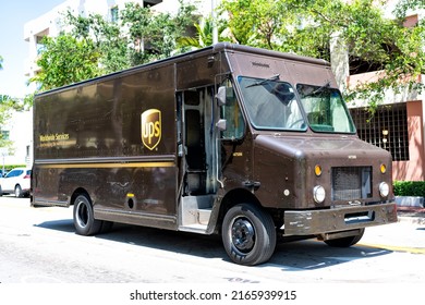 Miami Beach, Florida USA - April 14, 2021: united parcel service, corner view. brown postal truck