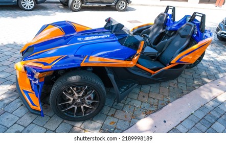 Miami Beach, Florida USA - April 15, 2021: Blue Orange Polaris Slingshot, Top View.