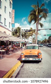 MIAMI BEACH, FLORIDA, USA - FEBRUARY 18, 2018: Vintage Car Parked along Ocean Drive in the Famous Art Deco District in South Beach. South Beach, FL