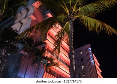 Miami Beach, Florida USA - February 28, 2019: Night Cityscape View Of The Classic Art Deco Hotel Architecture With Neon Lights On Popular Ocean Drive.