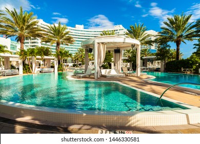 Miami Beach, Florida USA - October 3, 2012: The Beautiful Pool Area Of The Historic Art Deco Style Fontainebleau Hotel Designed In The 1950s.