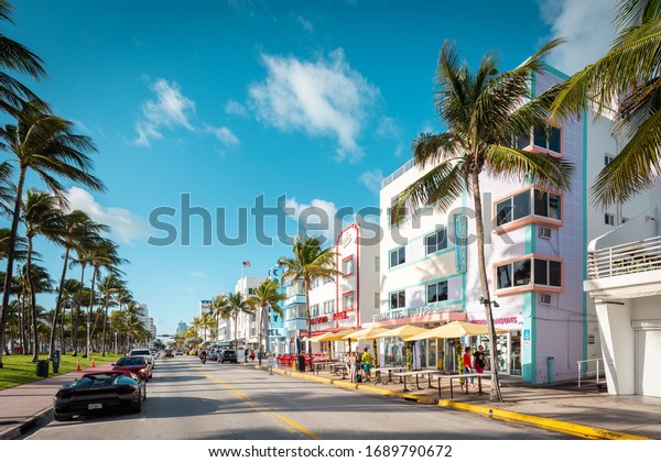 Miami Beach, Ocean\
Drive FL, USA - March 2, 2020: One of the most famous streets on\
east coast of USA. Morning vibes at Ocean Drive. Beautiful Art Deco\
Historic District.