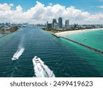 Miami Beach scene from drone, Florida, USA. Miami seaside. Aerial view of Miami Beach and cityscape. Coastline of Miami Beach, aerial view. Famous American landmarks.