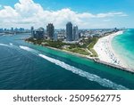 Miami Beach scene from drone, Florida, USA. Miami seaside. Aerial view of Miami Beach and cityscape. Coastline of Miami Beach, aerial view. Famous American landmarks. Summer travel in USA.