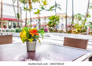 Miami Beach At South Beach City With Closeup Of Outdoor Cafe Restaurant Food Table And Flowers In Vase And Background Of Lincoln Road Street