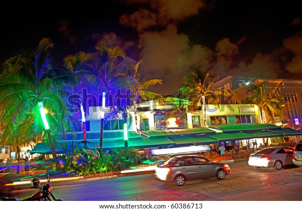 MIAMI BEACH,\
USA - AUGUST 02: Night view at Ocean drive on August 02,2010 in\
Miami Beach, Florida. Art Deco Night-Life in South Beach is one of\
the main tourist attractions in\
Miami.