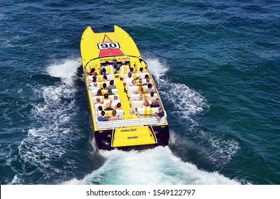 Miami Beach,Florida,U.S.A. 2 November 2019.Overhead View Of Tourists Enjoying A High Speed Tour Of The Miami Waterfront In A Modified Power Speedboat.