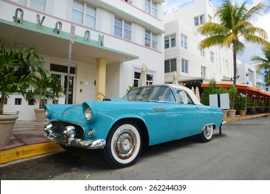 MIAMI - DEC 24: 1957 Ford Thunderbird In Front Of Art Deco Style Avalon Hotel In Miami Beach On December 25th, 2012 In Miami, Florida, USA