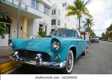 MIAMI - DEC 24: 1957 Ford Thunderbird In Front Of Art Deco Style Avalon Hotel In Miami Beach On December 25th, 2012 In Miami, Florida, USA