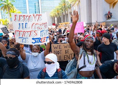 Miami Downtown, FL, USA - MAY 31, 2020: U.S. cities fear more destruction as protesters rage against police brutality. Violent protests on Sunday over the death of George Floyd in police custody