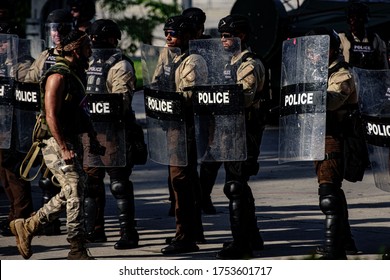 Miami Downtown, FL, USA - MAY 31, 2020: Police And Protesters In US. Protesters Gather In Downtown Miami For Protests For George Floyd. Peaceful Demonstrations Turned Into Violent, Riots