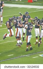 MIAMI - FEB 4: Members of the Chicago Bears jump on the field before playing Super Bowl XLI against the Indianapolis Colts at Dolphins Stadium on February 4, 2007 in Miami, Florida.