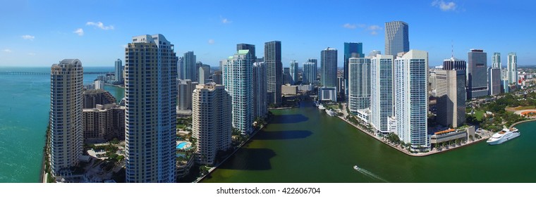 MIAMI - FEBRUARY 25, 2016: Downtown aerial skyline on a beautiful morning. Miami attracts 10 million tourists annually.