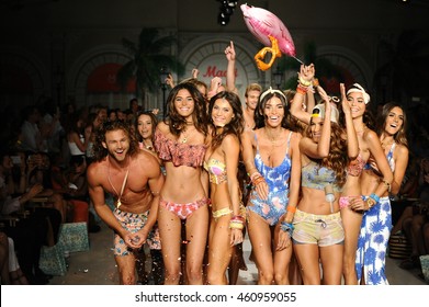 MIAMI, FL - JULY 17: Designers And Modes Walk The Runway During Maaji Spring Summer 2017 Runway Show At Funkshion Tent On July 17, 2016 In Miami Beach, FL