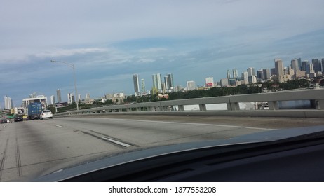 MIAMI, FL - OCTOBER 7, 2014: Skyscrapers And Other Buildings In Downtown Miami As Taken From Dolphin Expressway (FL-836)