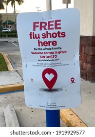 Miami, Fl, USA: Feb 18, 2021: CVS Pharmacy Bilingual Outdoor Sign For Free Flu Shots Available For The Entire Family. 