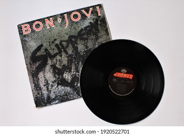 Miami, Fl, USA: Feb 19, 2021: Glam Metal And Hard Rock Artist, Bon Jovi Music Album On Vinyl Record LP Disc. Titled: Slippery When Wet