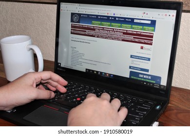 Miami, FL, USA- Feb 5, 2020: Person Living Out Of State Applying For Unemployment Insurance Benefits Using Texas Workforce Commission Website Under The CARES Act Due To COVID19 Pandemic, Pua Peuc Fpuc