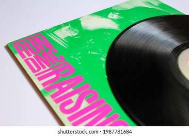 Miami, FL, USA: June 2021: Hip Hop And Rap Rock Band, Run-DMC Music Album On Vinyl Record LP Disc. Titled: Raising Hell Album Cover