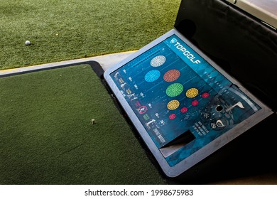 Miami, FL, USA; June 2021: TopGolf golf ball machine that spits out a ball after you hover over the specified area. 