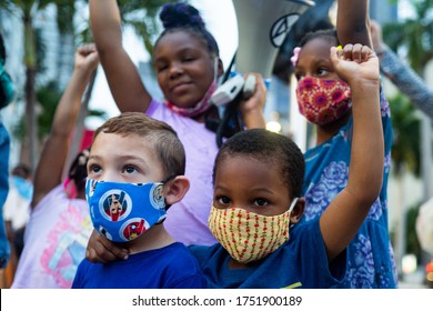 Miami, FL, USA - JUNE 7, 2020: White And Black Boys Together. Friends. Anti Racism Demonstration. Children Of Different Races Together