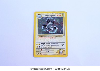 Miami, FL, USA: March 14, 2021: Lt. Surge's Magneton Pokemon Card. The Pokémon Trading Card Game Is A Collectible Card Game, Based On Nintendo's Pokémon Franchise Of Video Games And Anime. Gym Heroes