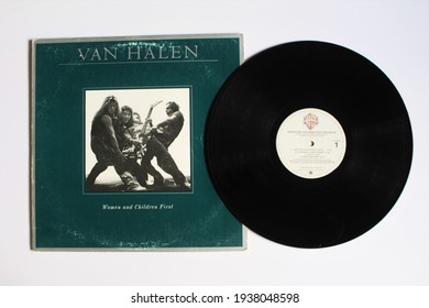 Miami, FL, USA: March 17, 2021: Hard Rock, Heavy Metal And Glam Metal Band, Van Halen Music Album On Vinyl Record LP Disc.  Titled: Women And Children First Album Cover