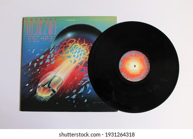 Miami, Fl, USA: March 7, 2021:
Hard Rock And Soft Rock Band,  Journey Band Music Album On Vinyl Record LP Disc. Titled: Escape Album Cover