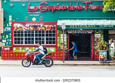 Miami, FL, USA - May 8, 2018: Scenes of daily life in Little Havana play out amidst a backdrop of pulsating traditional Cuban and Afro-Cuban music, storefronts, art galleries and quaint restaurants. 