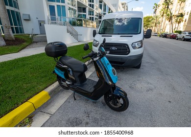 MIAMI, FL, USA - NOVEMBER 15, 2020: Revel Rental Scooter Rideshare Parked At Edgewater Miami Florida USA