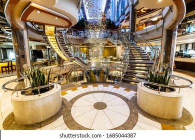 MIAMI, FL, USA - OCTOBER 13, 2019: The interior of a Royal Caribbean cruise ship, Navigator of the Seas with people enjoying their vacation on the ocean.