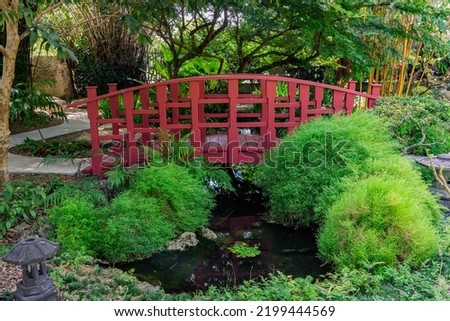 Miami, Florida - September 8,2022: Miami Beach Botanical Garden: Japanese Garden with little bridge and the pond
