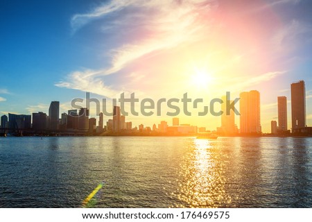 Miami Florida, sunset  with colorful illuminated business and residential buildings 