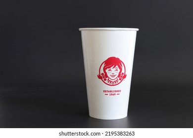 MIAMI, FLORIDA USA - 08-26-2022
Wendy's Drinking Cup Isolated Against Dark Background.