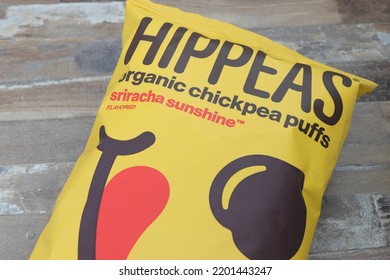 MIAMI FLORIDA USA - 09-09-2022:
Bag Of HIPPEAS Sriracha Sunshine Flavored Chickpea Snack Puffs Isolated Against Textured Background.