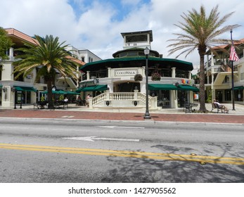 MIAMI, FLORIDA, USA - APRIL 10, 2013: Cocowalk Mall, Located In The Charming Neighborhood Of Coconut Grove, One Of The Main Tourist Sites Of The City, With Shops, Restaurants And Cultural Life.