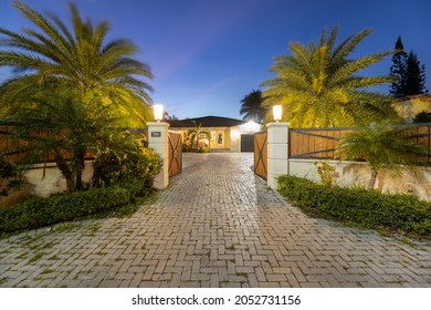 Miami, Florida, USA. April 3, 2021: Entrance Of A Classic Mansion Photographed At Night.