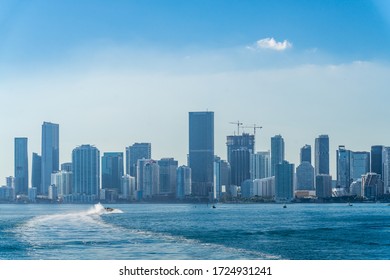 Miami, Florida / USA - December 19 2018: Skyline Of Miami Seem During Boat Tour. We Can See Many Skyscrapers Above The Sea Level Pointing To The Sky. Boat Tour Is One Of The Must Do Thing In Miami