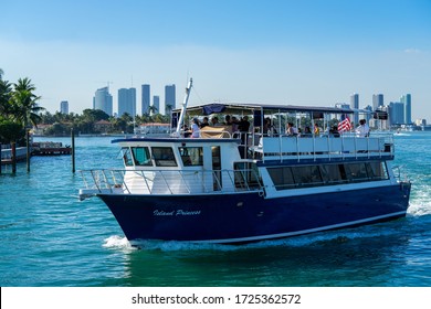 Miami, Florida / USA - December 19 2018: Skyline Of Miami Seem During Boat Tour. We Can See Many Skyscrapers Above The Sea Level Pointing To The Sky. Boat Tour Is One Of The Must Do Thing In Miami