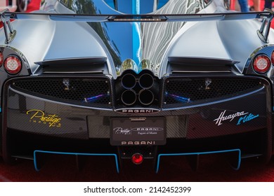 Miami, Florida USA - February 20, 2022: Close up view of the rear of a exotic Italian Pagani Huayra Roadster supercar on display at the public Miami Concours car show in the upscale Design District.
