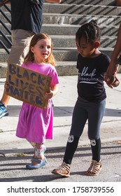 Miami, Florida, USA - June 08, 2020: Kids Holding Black Lives Matter Sign. Many People Went To Peaceful Protests In The US. Justice, Crowd Near Richard E. Gerstein Justice Building Complex