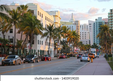 Miami, Florida / USA - May 12 2019: Street With Parked Cars, Hotels And Palm Trees In Miami Beach