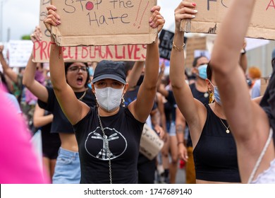 Miami, Florida/USA - June 02, 2020: Peaceful Protesters In A Protest Against The Death In Minneapolis Police Custody Of African-American Man George Floyd. Peoples Holds Sign In Hands.