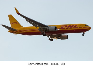 Miami, FL-USA-May 23, 2021: A DHL Boeing 767 cargo aircraft approaching to land at Miami International Airport. 
