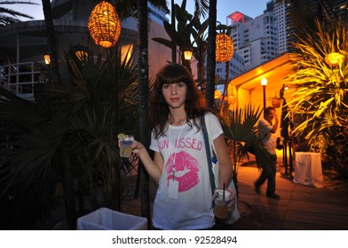 MIAMI - JULY 14: Models, Photographers And Guests At The Official Opening Pool Party At Railegh Hotel South Beach For Mercedes-Benz Swim Fashion Week On July 14, 2011 In Miami, FL