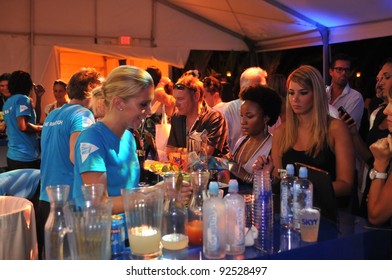 MIAMI - JULY 14: Models, Photographers And Guests At The Official Opening Pool Party At Railegh Hotel South Beach For Mercedes-Benz Swim Fashion Week On July 14, 2011 In Miami, FL